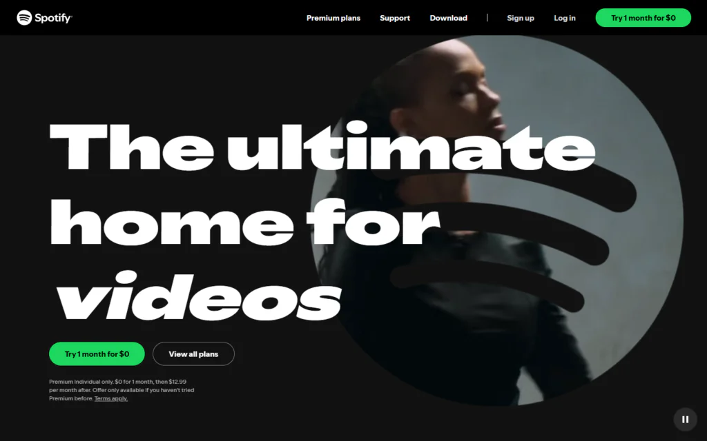 Spotify landing page built with Next.js, featuring the text The ultimate home for videos next to a circular image of a person, with buttons to sign up for a trial or view plans.